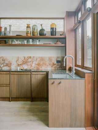 A mid-century kitchen with stacked shelving