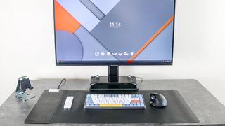 The Magic Mat Pro on a desk with a keyboard and mouse