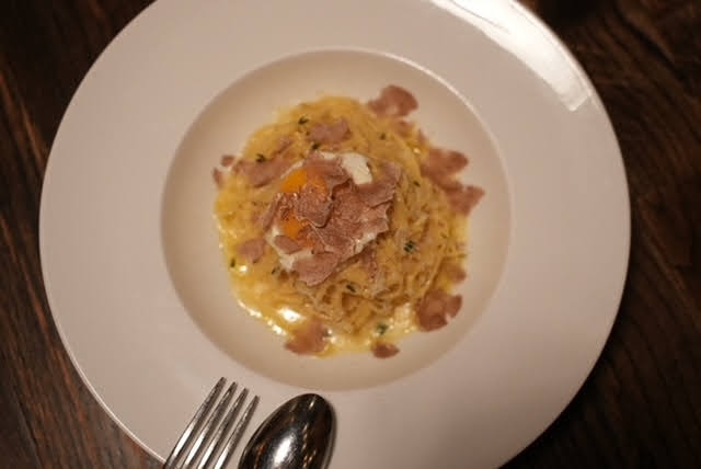 white truffles shavings on pasta