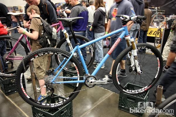 Soulcraft has added a new stock mountain bike model called Tradesman with standard geometry, a wishbone rear end, and a head tube decal instead of a proper badge. Retail cost for the frame is US$1,450 - a reasonable amount for a handbuilt chassis like this.