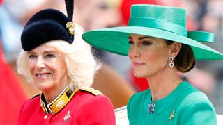 Queen Camilla and Catherine, Princess of Wales return to Buckingham Palace in a horse drawn carriage