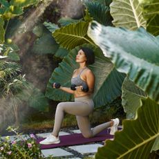 woman working out in garden