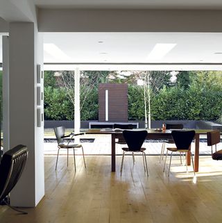 Dinning table with chair and wooden flooring