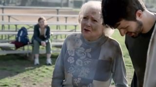 Betty White covered in mud, looking annoyed in a Snickers commercial