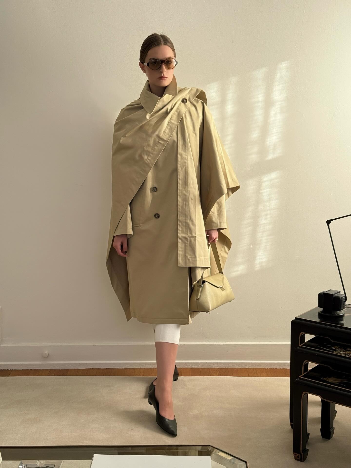 Christie Tyler wearing a trench coat.