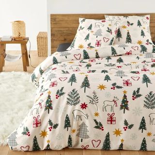 Best Chrsitmas bedding set lifestyle image in bedroom on bed with pillows