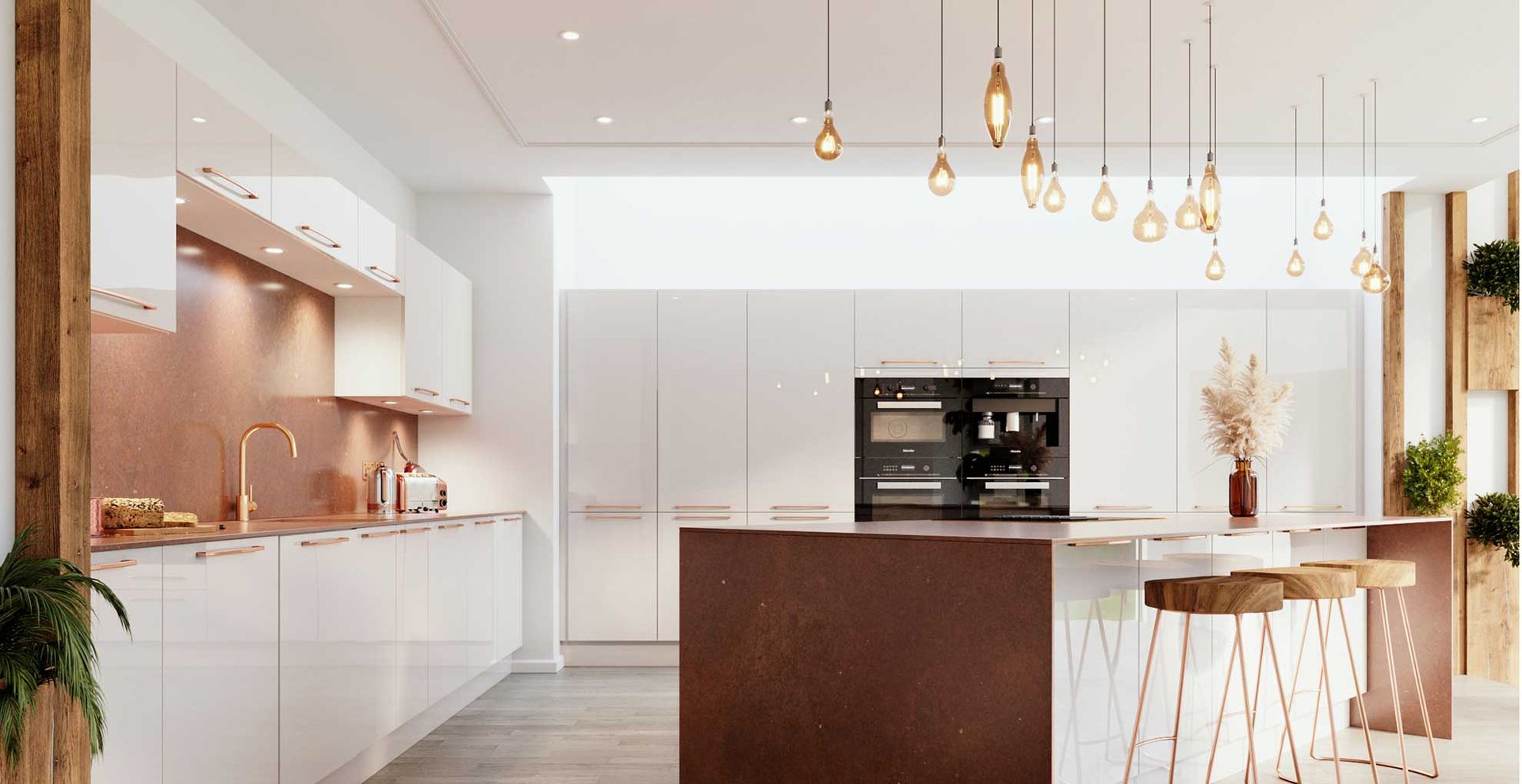 white kitchen with statement hangig pendant lights over the kitchen island to support a key kitchen trend 2024