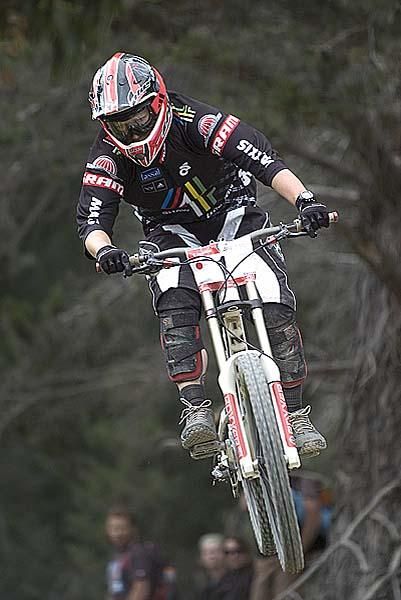 Leigh Douglas flies to a gold medal in the elite women's downhill.