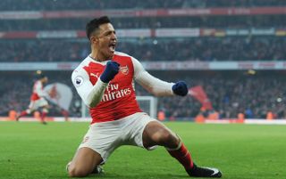 Chilean forward Alexis Sanchez playing for Arsenal, celebrating after scoring a goal