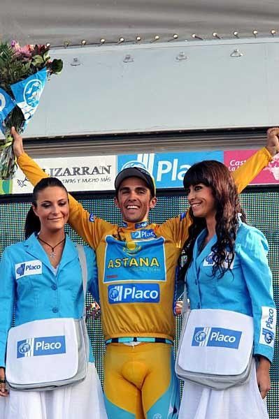 Winners get the babes... and doesn't Alberto know it!