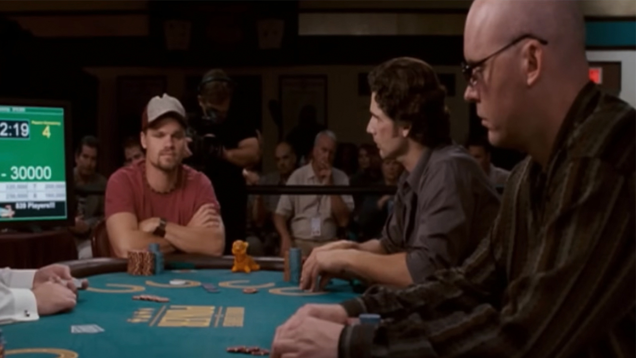 Three men sitting at a poker tournament table in Lucky You