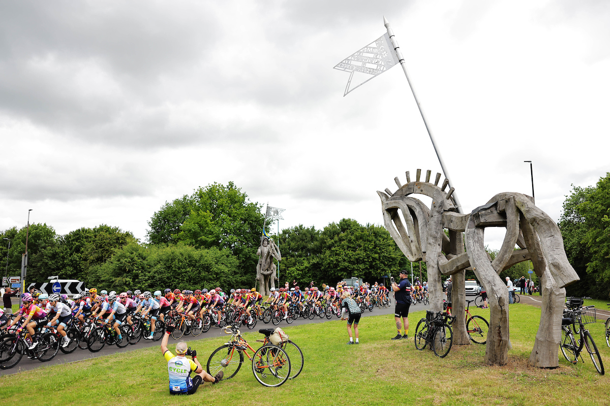 Picture by Alex Whitehead/SWpix.com - 08/06/2022 - Cycling - The Womenâ€™s Tour 2022 - Stage Three - Tewkesbury to Gloucester, England - The Bunch passing fans on the road side