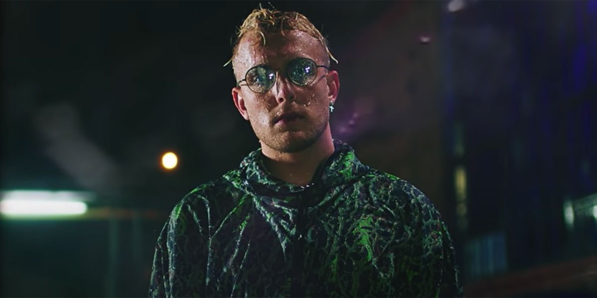 Jake Paul making it rain in music video screenshot