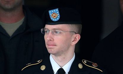 Bradley Manning, who will now go by Chelsea Manning, is escorted out of a military court facility during the sentencing phase of his trial on Aug. 20.