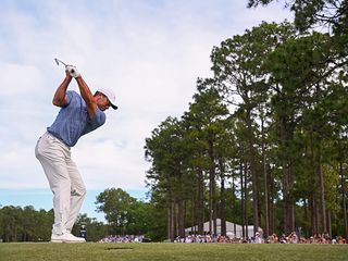 Tiger Woods hitting a shot at Pinehurst No.2 in preparation for the US Open 2024