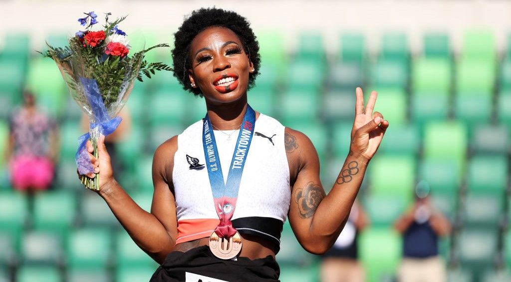 Gwen Berry displays an Activist Athlete shirt as she celebrates finishing third in the Women&#039;s Hammer Throw final on day nine of the 2020 U.S. Olympic Track &amp; Field Team Trials at Hayward Field