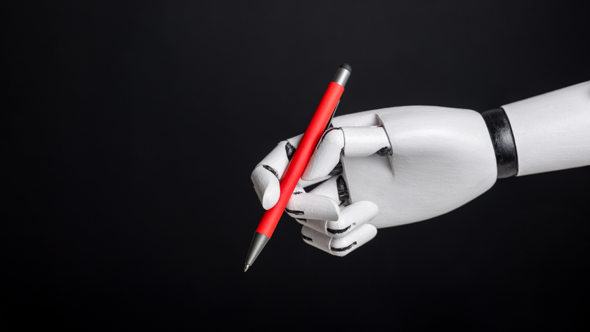 A robotic hand holding a red pen on a black background, blending modern technology with timeless utility