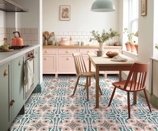 pink and green Shaker kitchen with patterned porcelain floor tiles