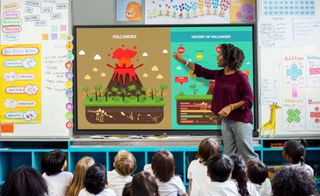 Teacher and students using LG smartboard