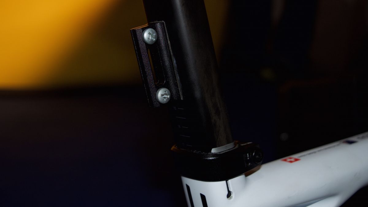 The race number holder is glued to the seat post.