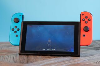 how to charge Nintendo Switch controllers — attach to Switch