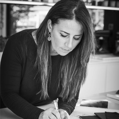 black and white picture of interior designer Natalie Fry from Grid Thirteen