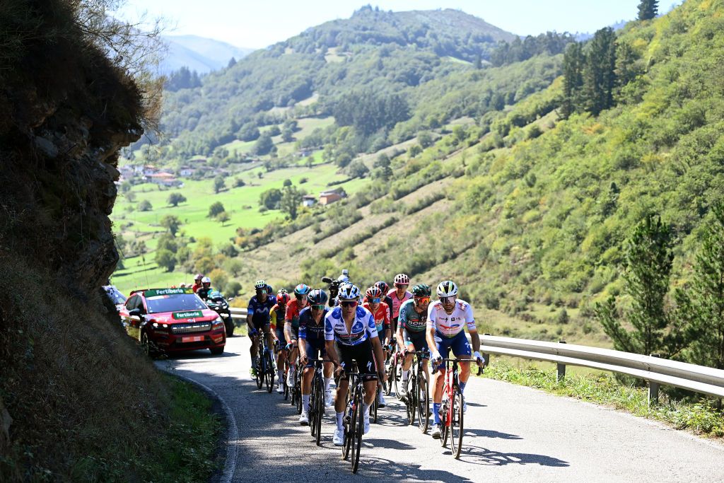 LACRUZDELINARES SPAIN SEPTEMBER 14 A general view of Remco Evenepoel of Belgium and Team Soudal Quick Step Polka dot Mountain Jersey Egan Bernal of Colombia and Team INEOS Grenadiers Damiano Caruso of Italy and and Team Bahrain Victorious Lewis Askey of The United Kingdom Lorenzo Germani of Italy and Team Groupama FDJ Nico Denz of Germany and Team BORA Hansgrohe Jarrad Drizners of Australia Andreas Kron of Denmark and Team Lotto Dstny Andrea Piccolo of Italy and Team EF EducationEasyPost Imanol Erviti of Spain and Movistar Team Max Poole of The United Kingdom and Team DSM firmenich Hugo Hofstetter of France and Team Arka Samsic and Paul Ourselin of France and Team TotalEnergies compete in the breakaway during the 78th Tour of Spain 2023 Stage 18 a 1789km stage from Pola de Allande to La Cruz de Linares 840m UCIWT on September 14 2023 in La Cruz de Linares Spain Photo by Tim de WaeleGetty Images