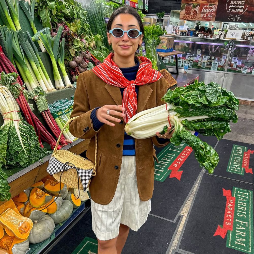 Influencer wears red rope sandals.