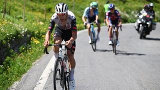 Joao Almeida breaks away in Stage 4 of the Tour de Suisse.