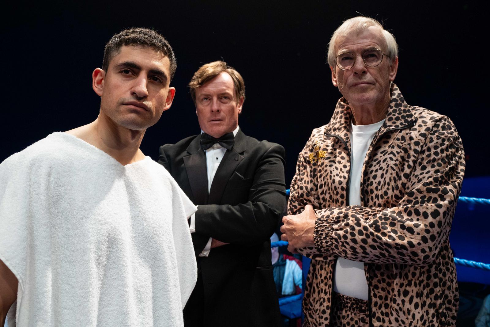 an image of Naz and Brendan Ingle in the film with promoter frank in the ring before a fight