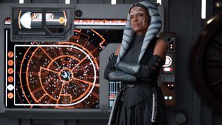 Rosario Dawson as Ahsoka standing with her arms crossed