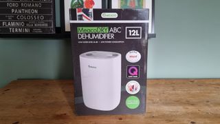 MeacoDry ABC 12L dehumidifier boxed on wooden table