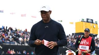 Tiger Woods walks off the course at the 2024 Open