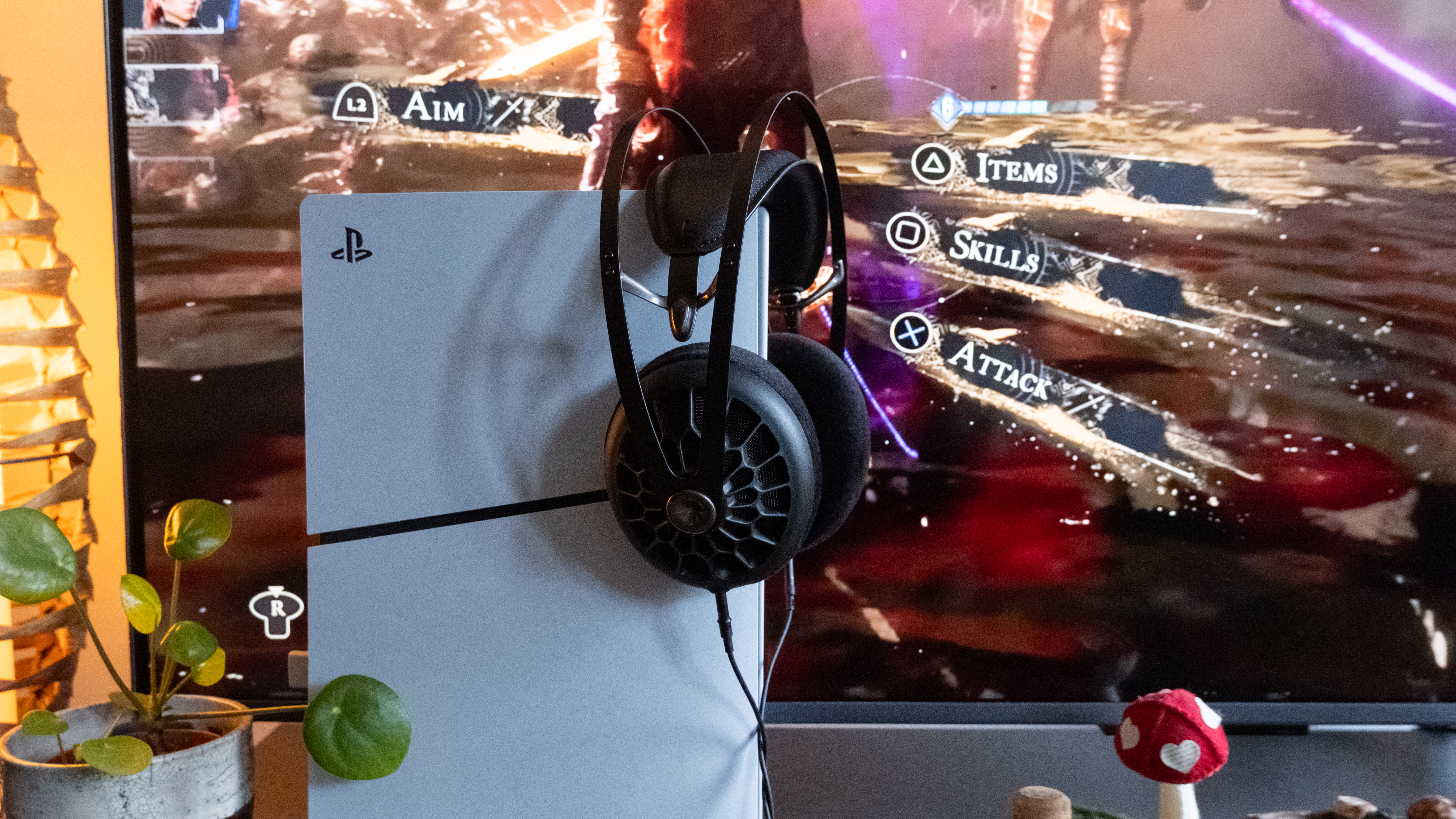 Meze 105 AER wired headphones being used with a PS5 Slim