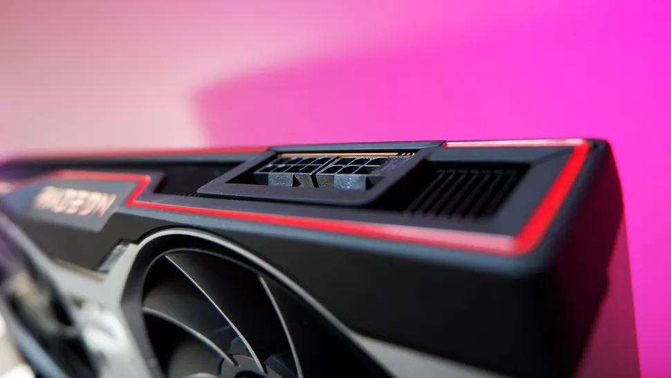Видеокарта AMD Radeon RX 6700 XT с красочным градиентным фоном.
