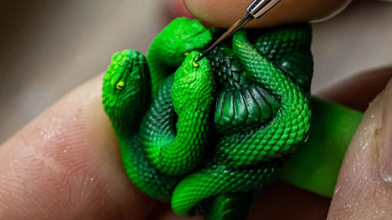 Razer has unveiled a highly limited hand-painted snake keycap, and it's so detailed you can make out its every scale