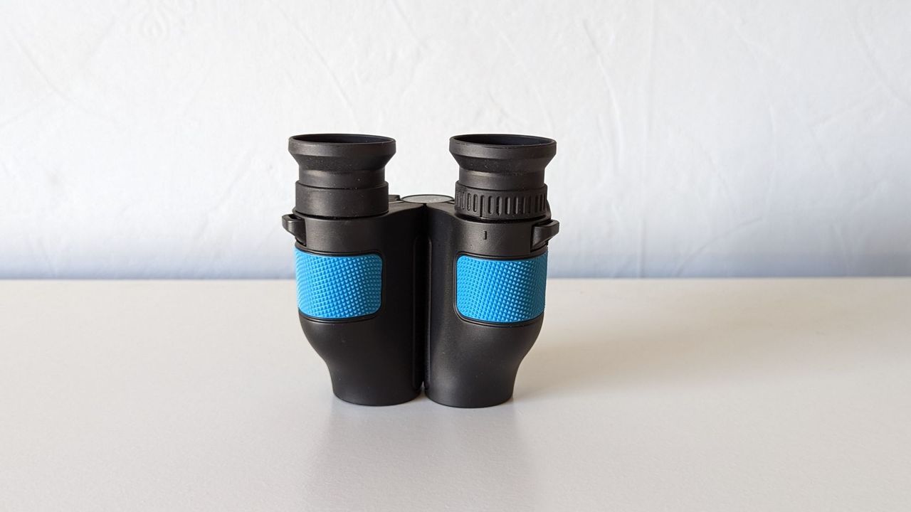 Occer 12x25 binoculars front view against white background