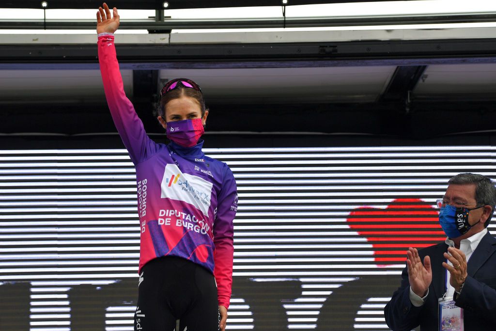 OJO GUAREA SPAIN MAY 22 Niamh FisherBlack of New Zealand and Team SD Worx Elise Purple Leader Jersey celebrates at podium during the 6th Vuelta A Burgos Feminas 2021 Stage 3 a 1154km stage from Medina de Pomar to Complejo Krstico de Ojo Guarea 768m VueltaBurgos BurgosFem UCIWWT on May 22 2021 in Ojo Guarea Spain Photo by Luc ClaessenGetty Images
