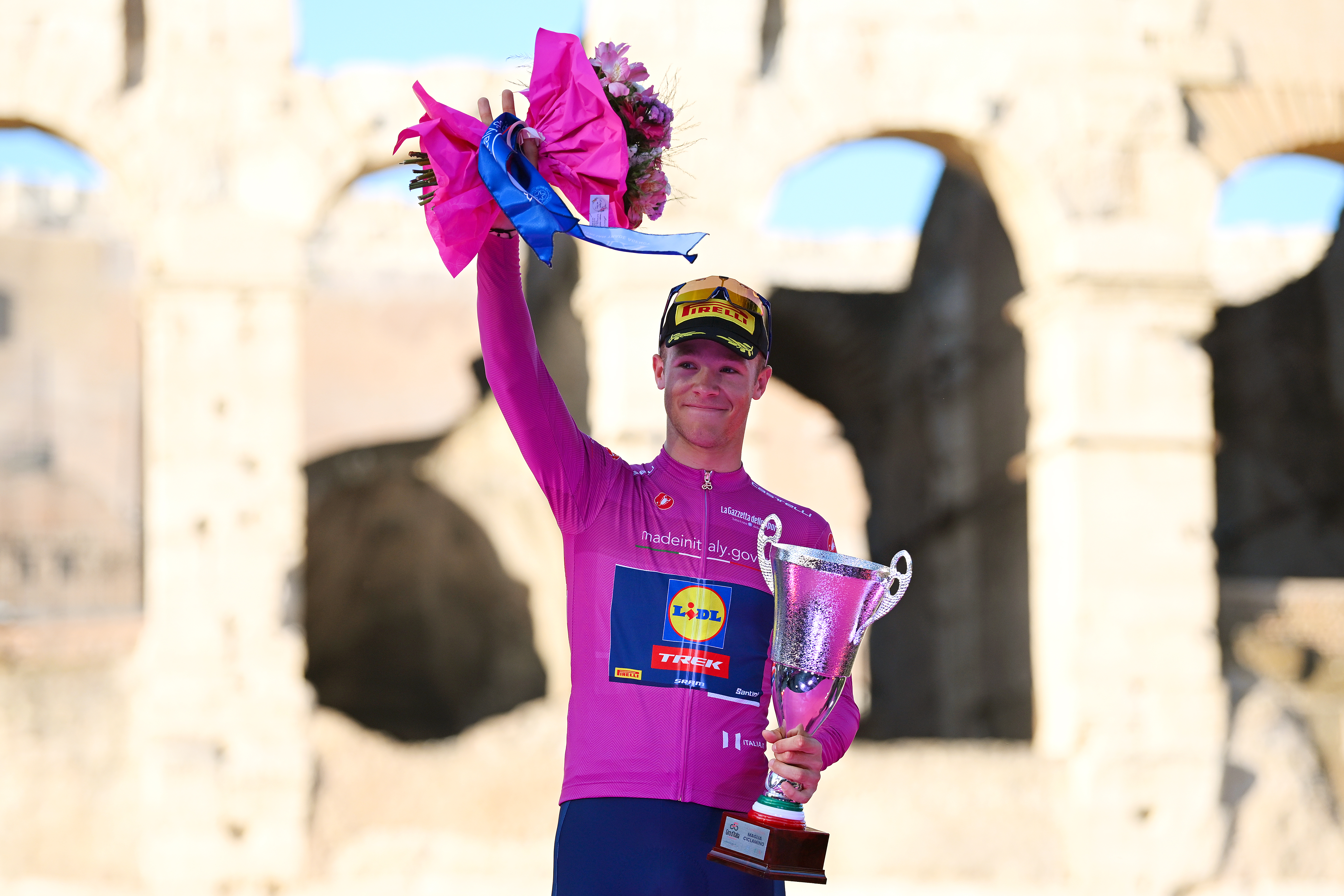 Jonathan Milan on the podium as the points classification winner at the Giro d'Italia 2024