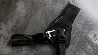 The padding of the BlackRapid Sport Breathe is substantial and has holes for added breathability too. Here you can also see the underarm security strap connected to the back of the padding via a metal buckle