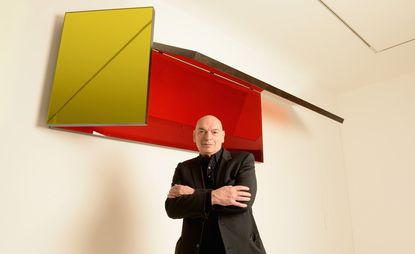 French architect Jean Nouvel stands in front of his work 'Miroir D