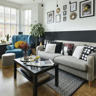 Monochrome living room, turquoise armchair