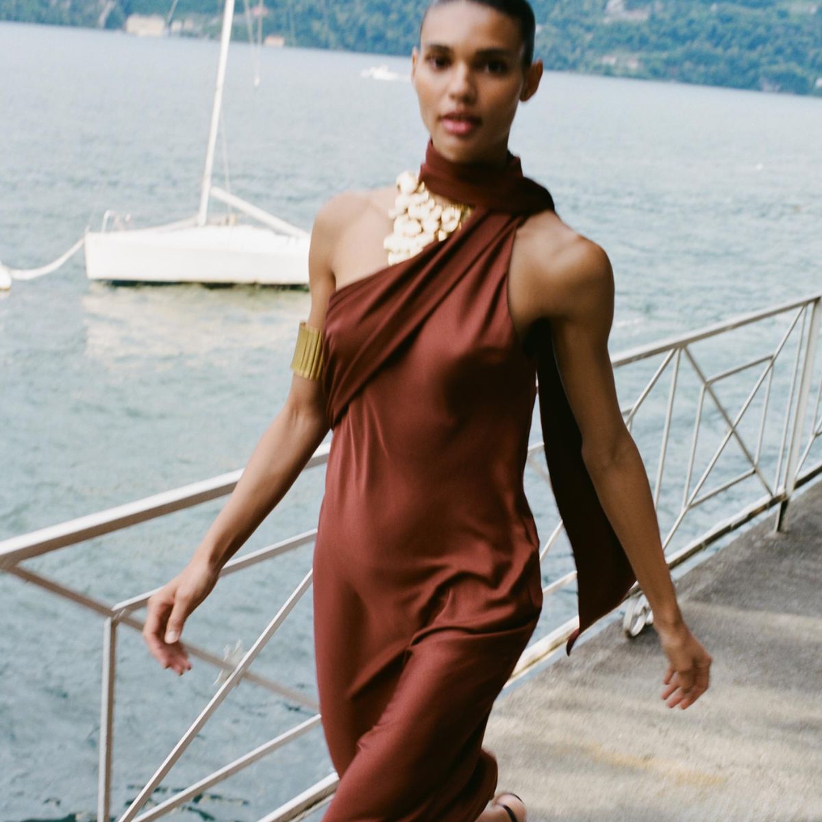 woman wearing brown scarf dress