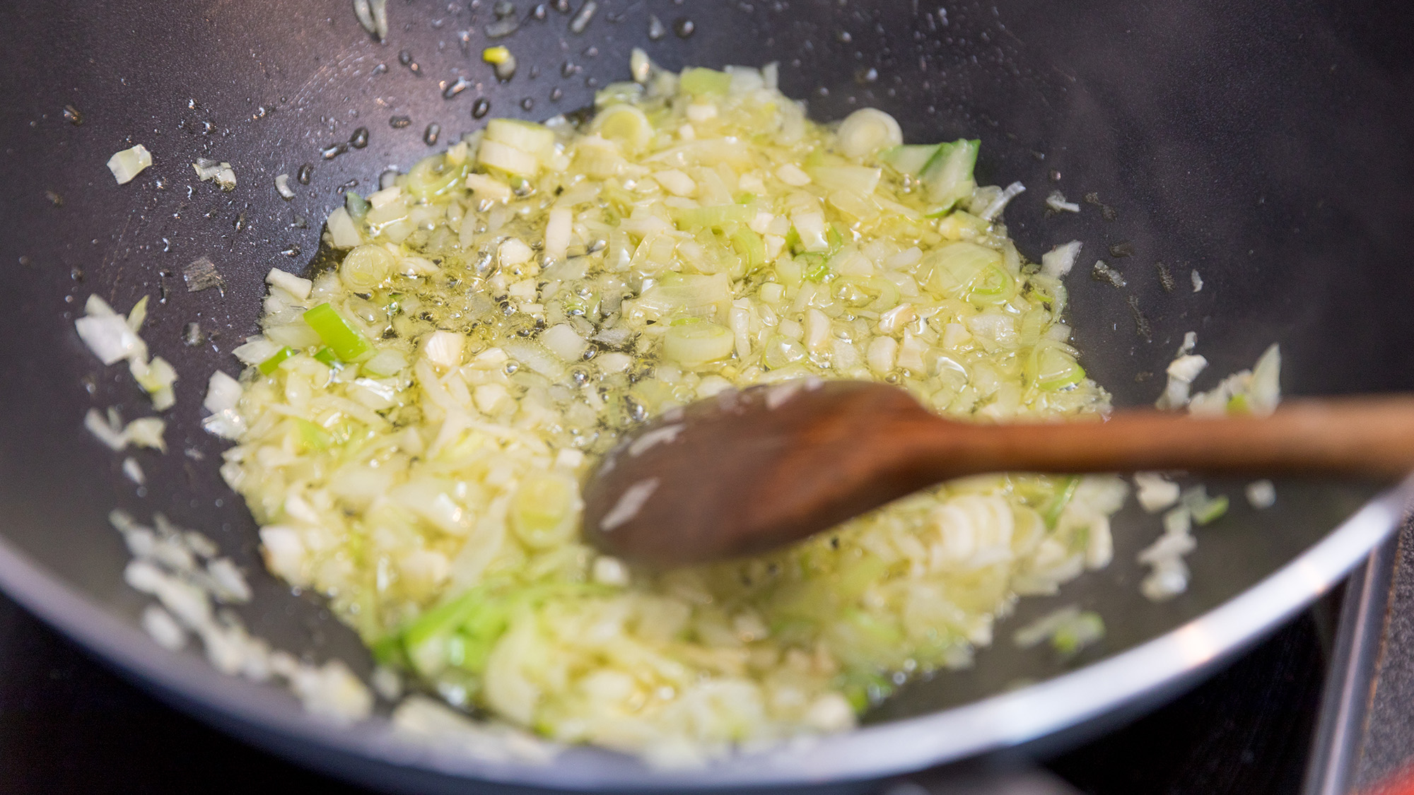 Frying onions in pan