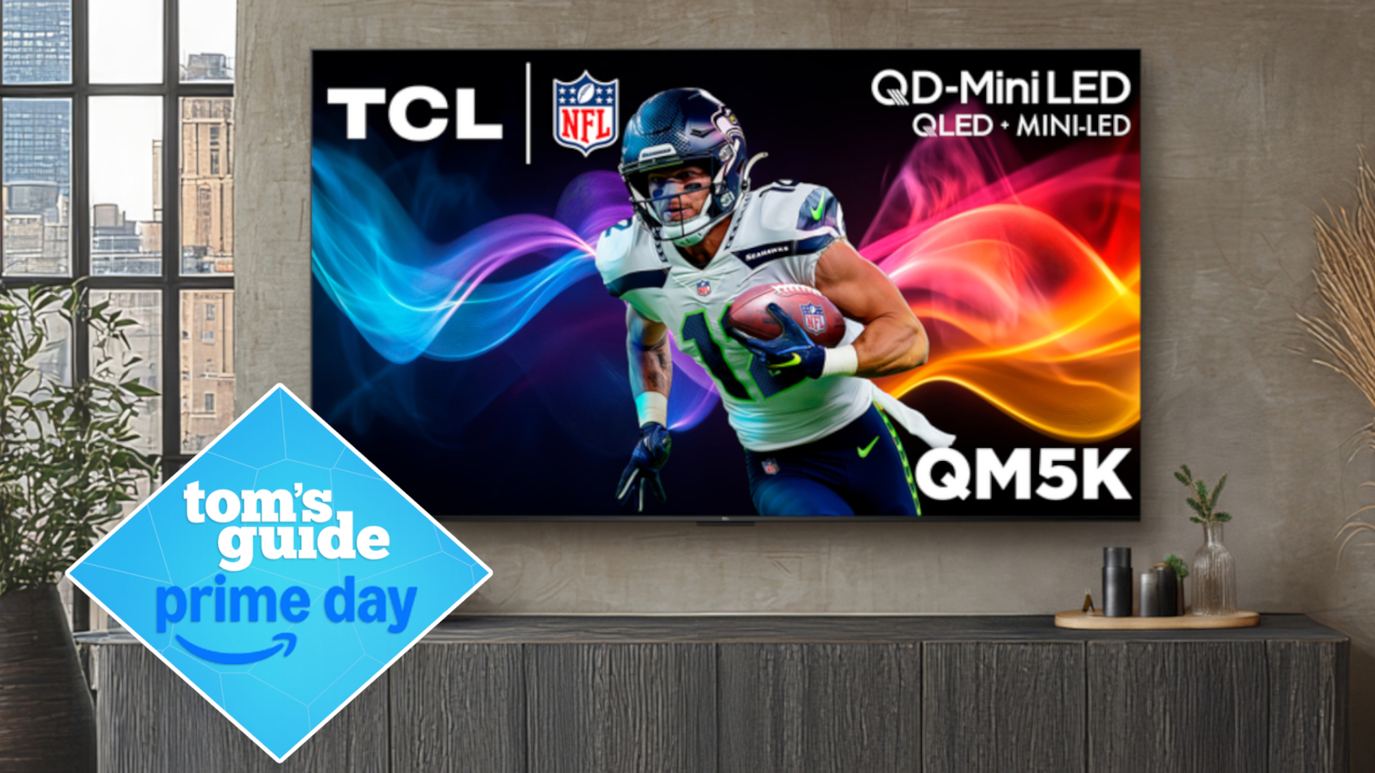 The TCL QM5K mounted on the wall of a modern living room. An NFL player is on the screen.