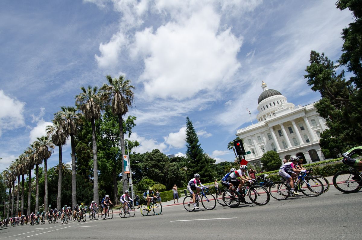 The peloton strung out past the capitol