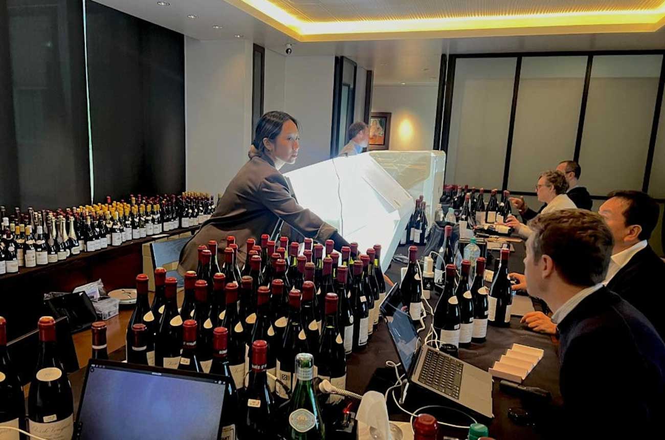 Chai Consulting team inspecting Wood Chen&rsquo;s collection