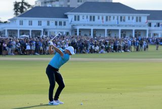 Rory McIlroy plays an iron shot into the 18th at the 2023 US Open