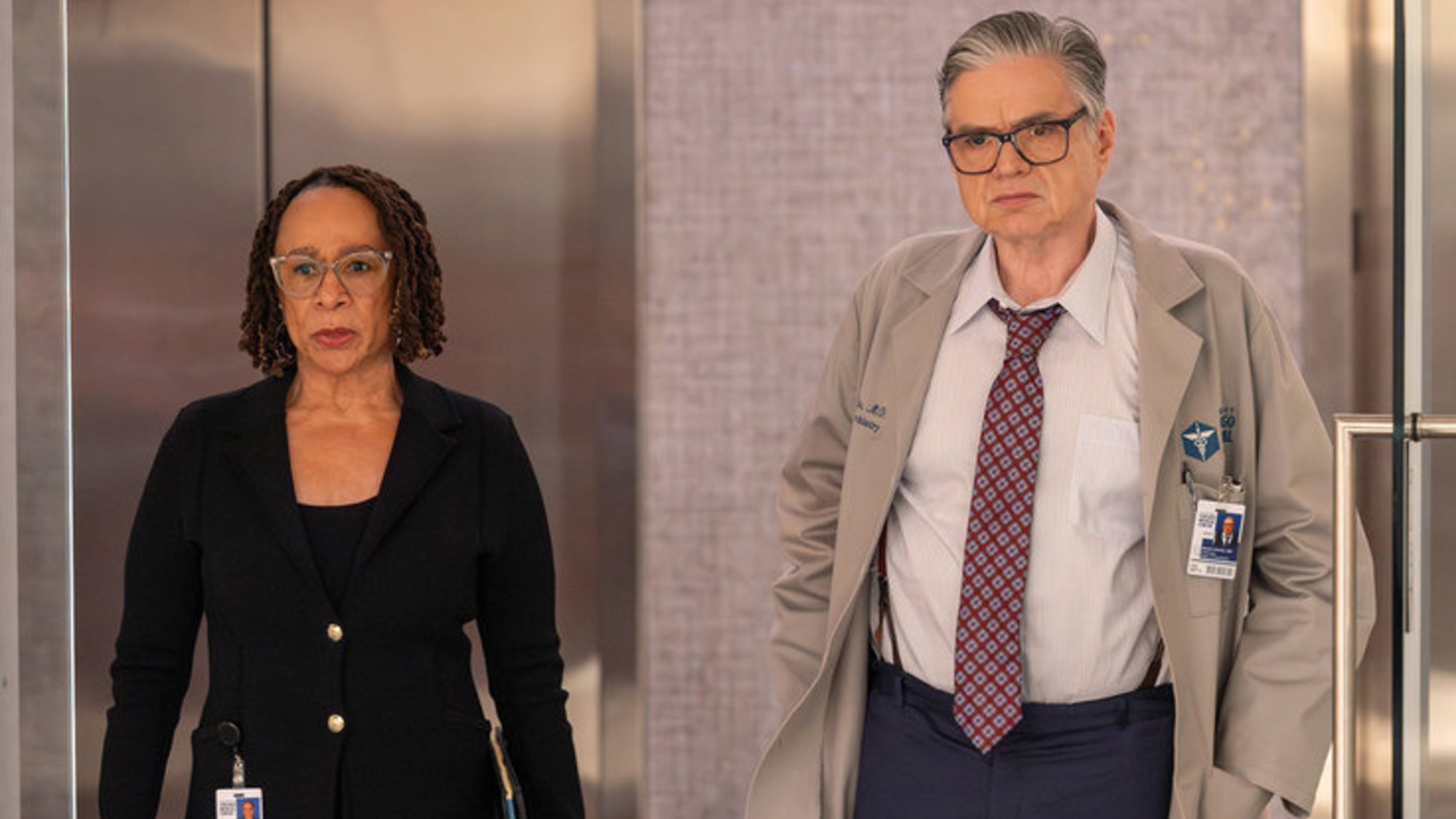 Goodwin and Dr. Charles standing next to each other on Chicago Med.