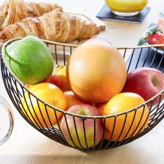 fruit bowl and fruit and dining table